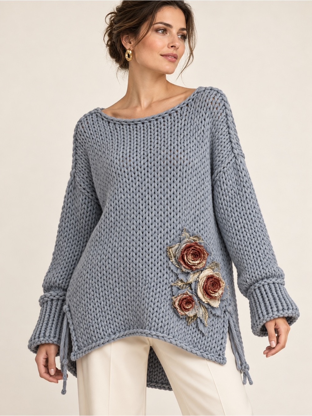Elisa Cavaletti by Daniela Dallavalle $450 chunky-knit floral appliqué sweater